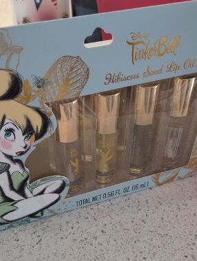 DISNEYS TINKERBELL Hibiscus Seed Lip Oil Set - Gold & Clear Shades